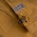 Dettagli sul cordoncino e sul tag NFC della DYEPOP SHIRT / CARAMELLO