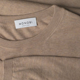 MONOBI label detail of COTTON CASHMERE WHOLEGARMENT 18G / CAMEL sweater
