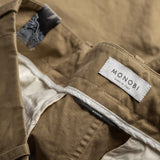MONOBI label detail of BIO GABARDINE ORIGIN CHINO / BEIGE CALDO