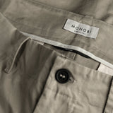 MONOBI label detail of BIO GABARDINE ORIGIN CHINO / GRIGIO