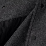 Button detail of RESPONSIBLE WOOL COACH JACKET / GRIGIO MELANGE