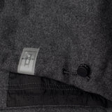 drawstring and NFC tag details of RESPONSIBLE WOOL COACH JACKET / GRIGIO MELANGE
