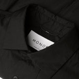 MONOBI label detail of ECO POP OUTERSHIRT / NERO