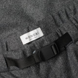 MONOBI label detail of RESPONSIBLE WOOL CHINO / GRIGIO MELANGE