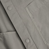 Button and pocket details of DYEPOP SHIRT / GHIACCIO