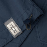 drawstring and NFC tag details of DYEPOP SHIRT / PETROLIO