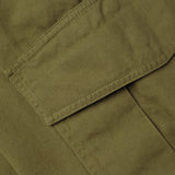 pocket detail of HERRINGBONE CARGO / VERDE RANA pants
