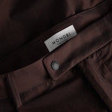 closure and MONOBI label detail of BIO COTTON TROUSERS / CIOCCOLATO
