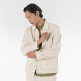 the model wears the origami outershirt / naturale jacket