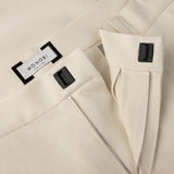 closure and MONOBI label details of ORIGAMI PANTS / NATURALE