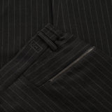 back pocket zip and NFC tag details of ORIGAMI WOOL PANTS / GESSATO