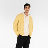 model wears PURE CASHMERE TIMELESS CARDIGAN 5G / SUN