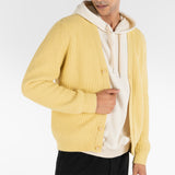 model wears PURE CASHMERE TIMELESS CARDIGAN 5G / SUN