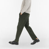 model wears AGELESS CORDUROY PANTS / VERDE MILITARE
