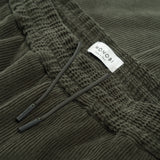 drawstring detail of AGELESS CORDUROY PANTS / VERDE MILITARE