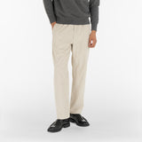 model wears AGELESS CORDUROY PANTS / GESSO