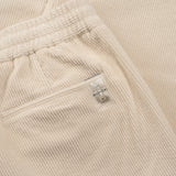 back pocket and NFC tag details of AGELESS CORDUROY PANTS / NATURALE