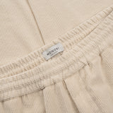 MONOBI label detail of AGELESS CORDUROY PANTS / NATURALE