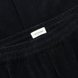 MONOBI label detail of AGELESS CORDUROY PANTS / BLUE NAVY