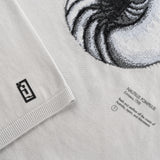 NFC tag detail of Maris Intarsia Wholegarment Tshirt Nautilus element