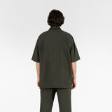 back position of the seersucker short sleeved shirt in deep green colour
