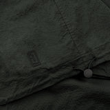 drawstring and NFC tag details of the seersucker short sleeved shirt in deep green colour