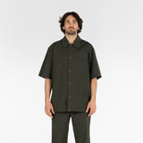 front of seersucker short sleeved shirt in deep green colour