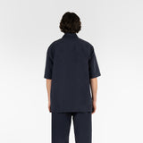 back position of the seersucker short sleeved shirt in blue colour