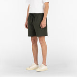 3/4 position of the seersucker drawstring shorts in deep green colour