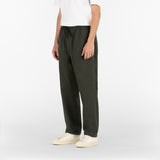 3/4 position of the drawstring seersucker pants in deep green colour