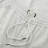 drawstring detail of seersucker pants in grey colour