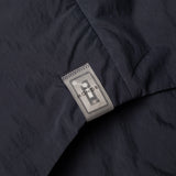 Dettaglio etichetta NFC di ECO POP OUTERSHIRT / BLU NAVY