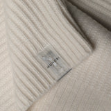 Dettaglio etichetta NFC del maglione PURE CASHMERE FISHERMAN RIB 5G / SNOW