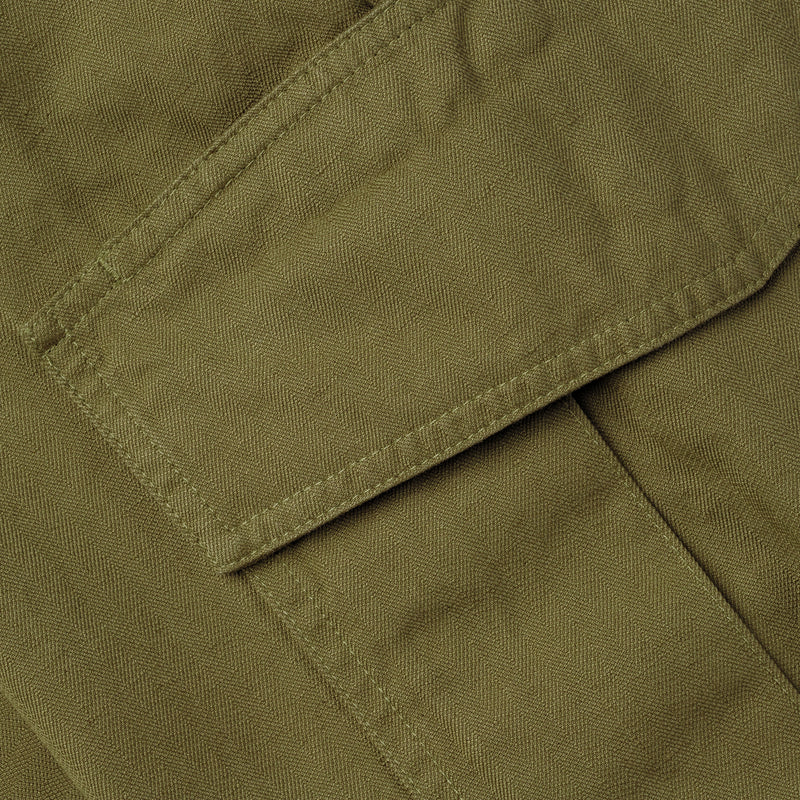 dettaglio della tasca dei pantaloni HERRINGBONE CARGO / VERDE RANA