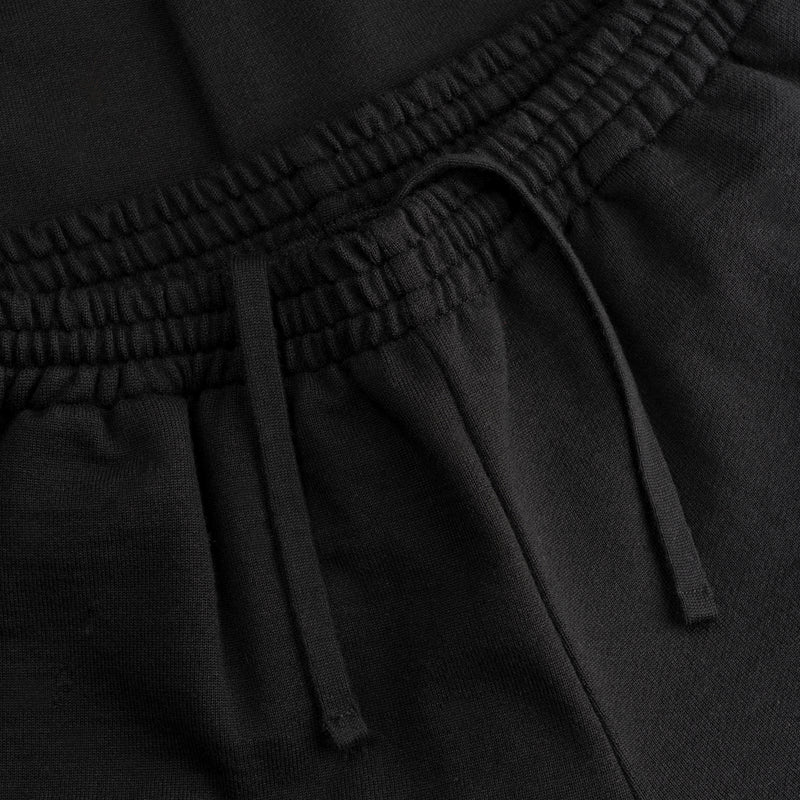 Dettaglio polsino elastico dei joggers loungewear in lana Superior colore nero