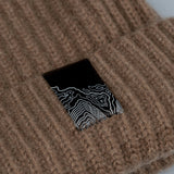 reverse of NFC tag detail of PURE CASHMERE BEANIE / SESAME