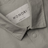collar and MONOBI label details of DYEPOP SHIRT / GHIACCIO