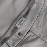 closure and MONOBI label details of BIO COTTON TROUSERS / GHIACCIO