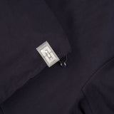 NFC tag and drawstring details of ORIGAMI OUTERSHIRT / INCHIOSTRO jacket