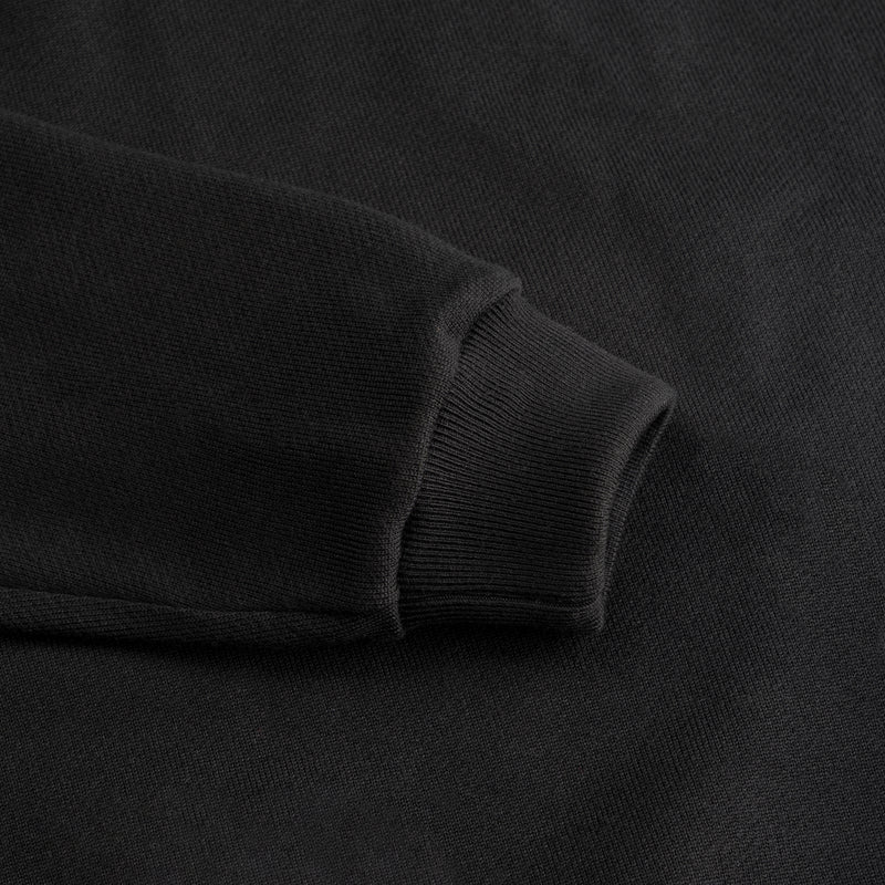 Sleeve detail of superior wool loungewear hoodie color black