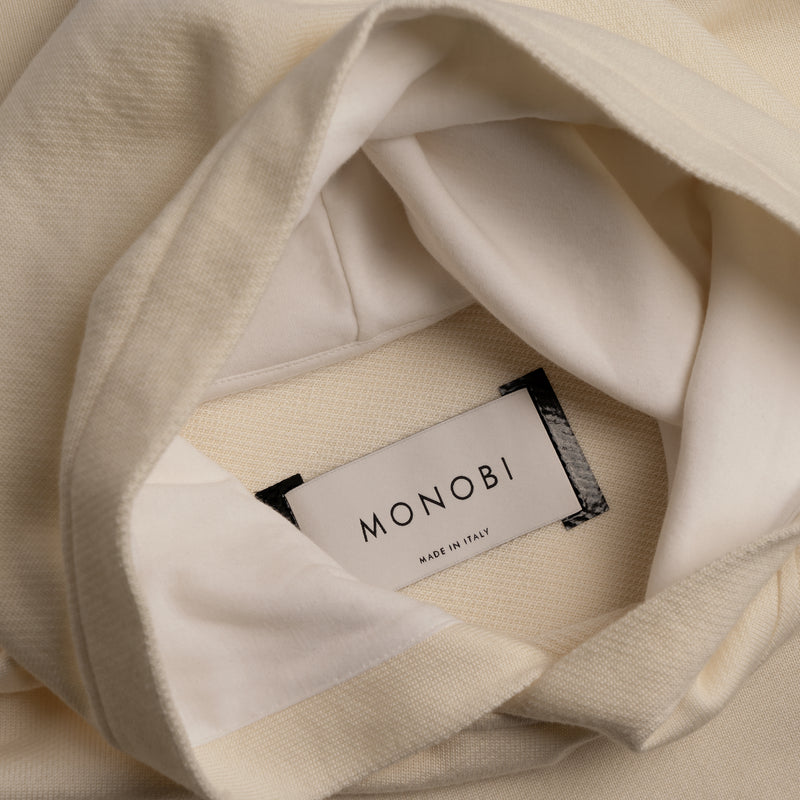 MONOBI label detail of Superior Wool Loungewear Hoodie color naturale